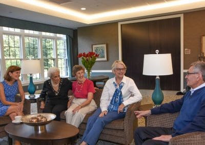 seniors in the Canterbury Woods lobby